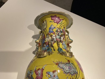 A Chinese yellow-ground famille rose 'warrior' vase, 19th C.