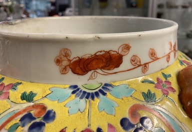 A Chinese famille rose covered vase and a vase with birds and peaches, 19/20th C.