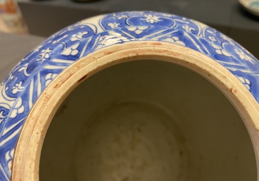 A pair of Chinese blue and white jars with floral design, Kangxi