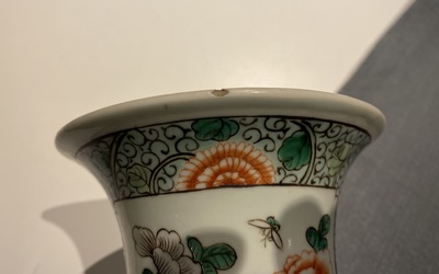 A Chinese famille verte vase and a blue and white vase, 19th C.