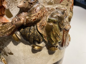 Two Japanese relief-moulded Satsuma vases, Meiji, 19th C.