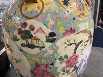 A Chinese famille rose covered vase and a vase with birds and peaches, 19/20th C.