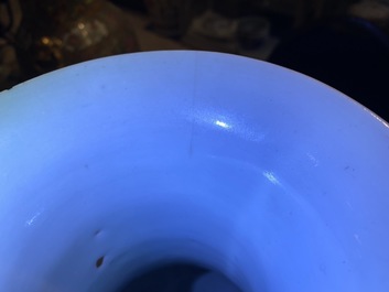 A Chinese famille verte vase and a blue and white vase, 19th C.