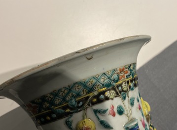 A Chinese relief-moulded famille rose 'antiquities' vase, 19th C.