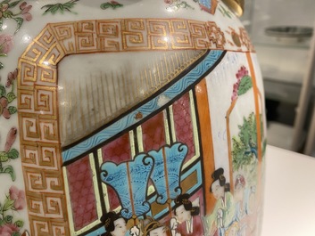 A pair of Chinese Canton famille rose vases, 19th C.