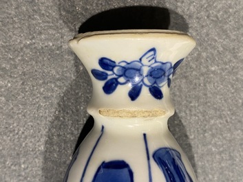 Four Chinese blue and white miniature vases and a huqqa base, Kangxi