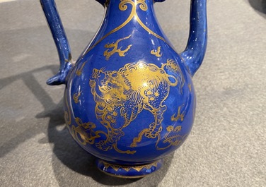 A Chinese gilt-decorated powder blue-ground jug with mythical beasts, Kangxi