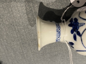 Four Chinese blue and white miniature vases and a huqqa base, Kangxi
