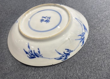 Six Chinese blue and white cups and saucers with horseriders, Kangxi