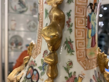 A pair of Chinese Canton famille rose vases, 19th C.