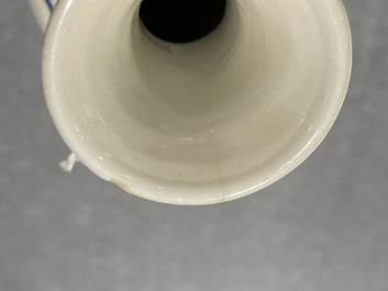 Four Chinese blue and white miniature vases and a huqqa base, Kangxi