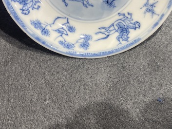 Six Chinese blue and white cups and saucers with horseriders, Kangxi