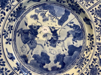 A Chinese blue and white 'Mongolian hunting' dish, Kangxi