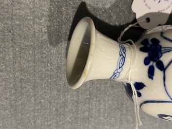 Four Chinese blue and white miniature vases and a huqqa base, Kangxi