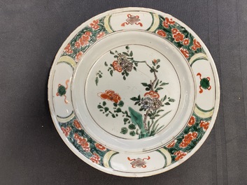 Two Chinese famille verte cup stands, a teapot and a plate, Kangxi