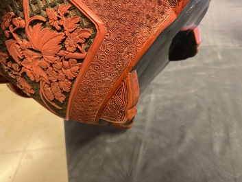 A Chinese quatrefoil jardini&egrave;re in red and black lacquer, Qianlong