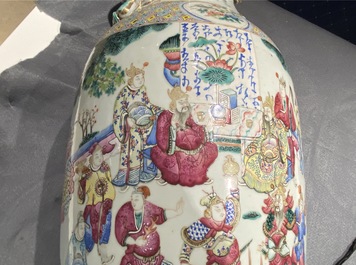 A Chinese famille rose vase with figures in a landscape, 19th C.