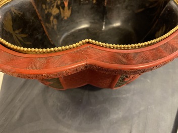 A Chinese quatrefoil jardini&egrave;re in red and black lacquer, Qianlong