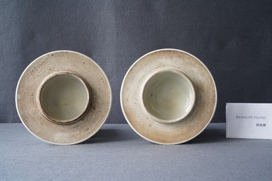 A pair of Chinese famille verte vases and covers, Kangxi mark, 19th C.