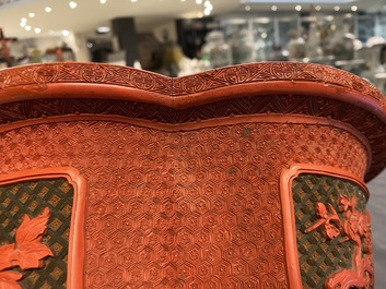 A Chinese quatrefoil jardini&egrave;re in red and black lacquer, Qianlong