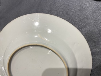 Deux assiettes en porcelaine de Chine en rouge de fer et dor&eacute; &agrave; d&eacute;cor du 'bapt&ecirc;me', Kangxi