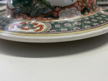 A pair of Chinese famille verte vases and covers, Kangxi mark, 19th C.