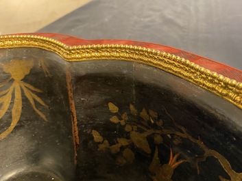 A Chinese quatrefoil jardini&egrave;re in red and black lacquer, Qianlong
