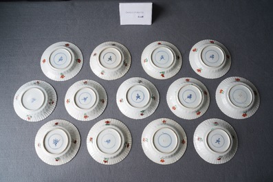 Eleven Chinese famille verte cups and thirteen saucers, Kangxi