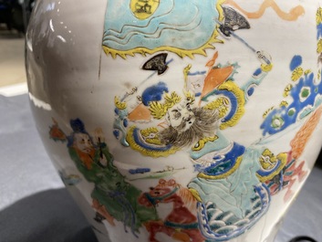 A Chinese gilt bronze lamp-mounted famille rose 'warrior' vase, 19/20th C.