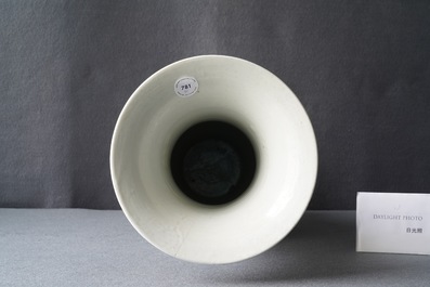 A Chinese famille noire 'magpie and prunus' yenyen vase, Kangxi