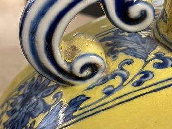 A Chinese yellow-ground blue and white 'Bajixiang' moon flask vase, Yongzheng mark, 19/20th C.