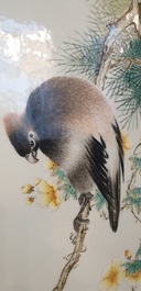 A large Chinese rectangular plaque with a bird on a blossoming branch, seal mark, Republic