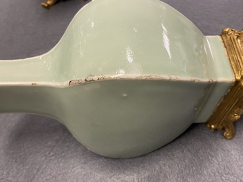 A pair of Chinese monochrome celadon vases with gilt bronze mounts, 18/19th C.