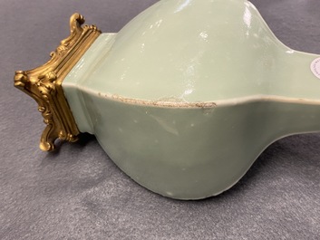 A pair of Chinese monochrome celadon vases with gilt bronze mounts, 18/19th C.