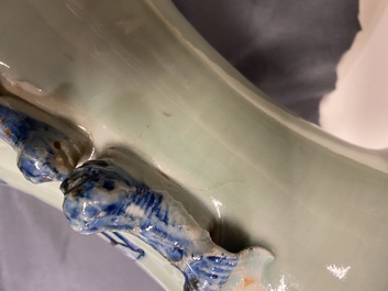 Vier Chinese vazen met blauw-wit decor op celadon fondkleur, 19e eeuw