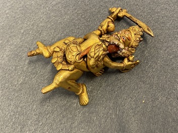 Two Sino-Tibetan gilt bronze figures, 19th C.