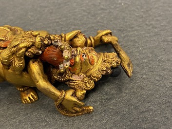 Two Sino-Tibetan gilt bronze figures, 19th C.