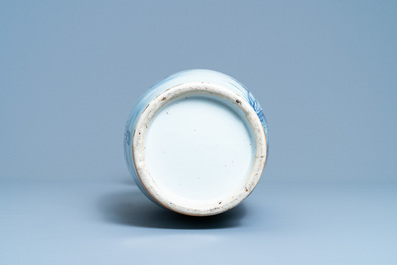 A Chinese blue, white and copper red vase with elephant handles, 19th C.