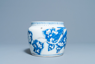 A Chinese blue, white and copper red 'prunus flowers' bowl, Kangxi