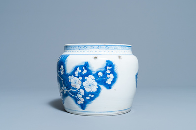 A Chinese blue, white and copper red 'prunus flowers' bowl, Kangxi
