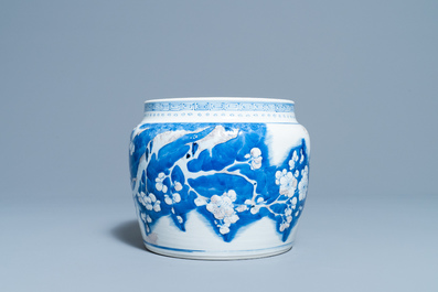 A Chinese blue, white and copper red 'prunus flowers' bowl, Kangxi