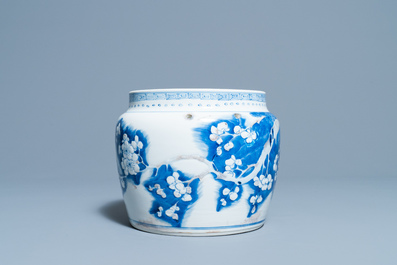 A Chinese blue, white and copper red 'prunus flowers' bowl, Kangxi