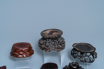 Twelve Chinese carved wooden stands, 19/20th C.