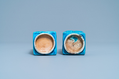 A pair of Chinese monochrome turquoise 'cong' vases with trigrams, 19th C.