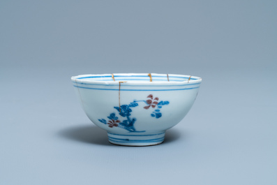 A Chinese blue, white and copper red bowl with kintsugi repair, Chenghua mark, Kangxi