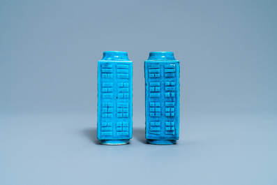 A pair of Chinese monochrome turquoise 'cong' vases with trigrams, 19th C.