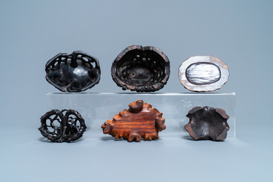Twelve Chinese carved wooden stands, 19/20th C.