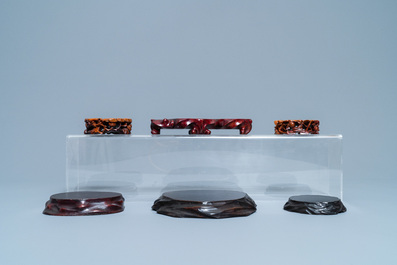 Twelve Chinese carved wooden stands, 19/20th C.