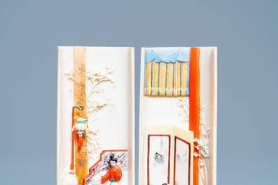 A pair of Chinese polychrome carved wrist rests in presentation box, Republic