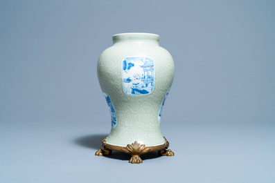 Een Chinese celadon vaas met blauw-witte en koperrode panelen, Kangxi
